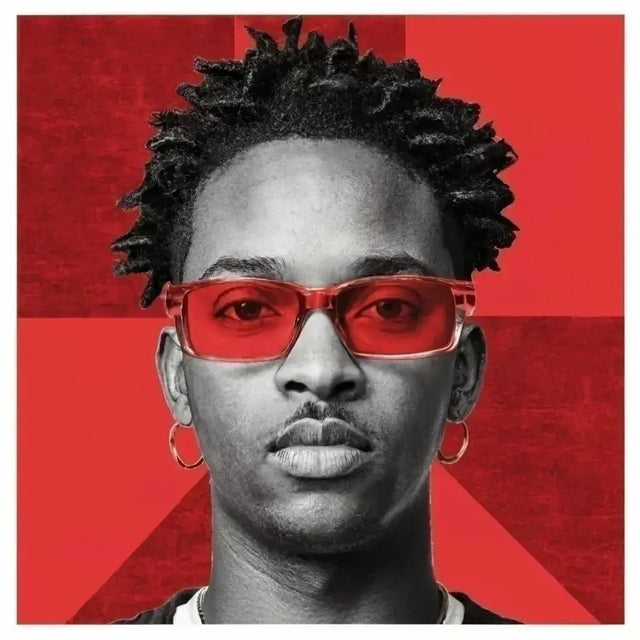 Man With Red Glasses Symbolizing Personal Growth And Reflection Against Hustle Culture.