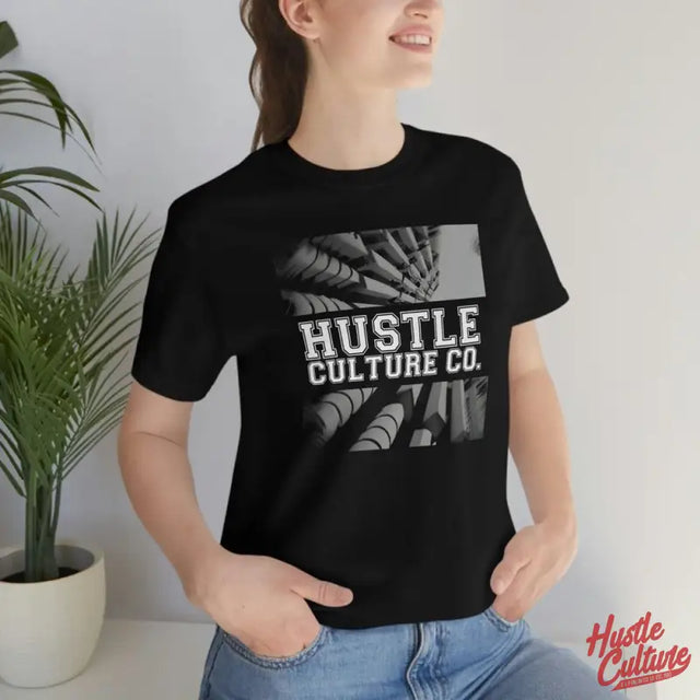 Woman Wearing Black Shirt With White Logo From Futuristic Streetwear Tee By Hustle Culture