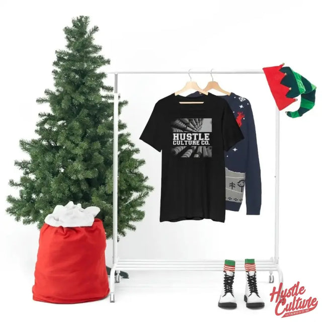 Futuristic Streetwear Tee From Hustle Culture On Rack With Christmas Tree