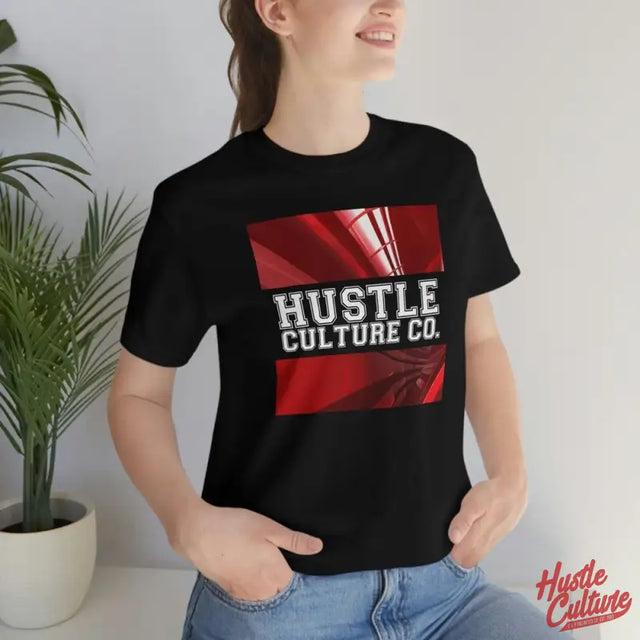 Red Robotic Culture Tee Worn By a Woman, Black Shirt With Red And White Logo